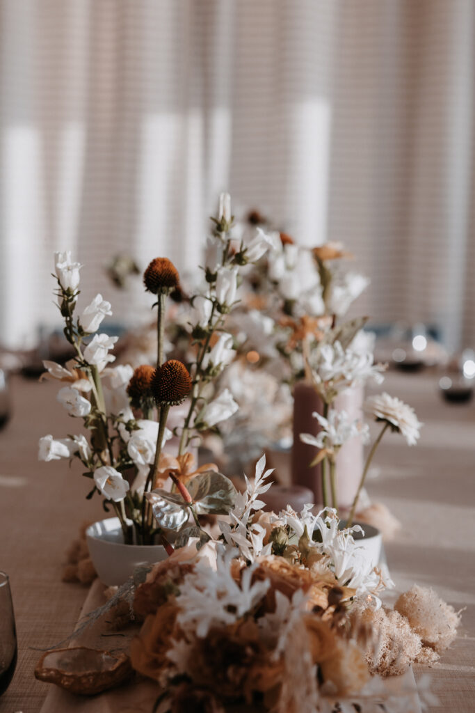 european florals on wedding reception table