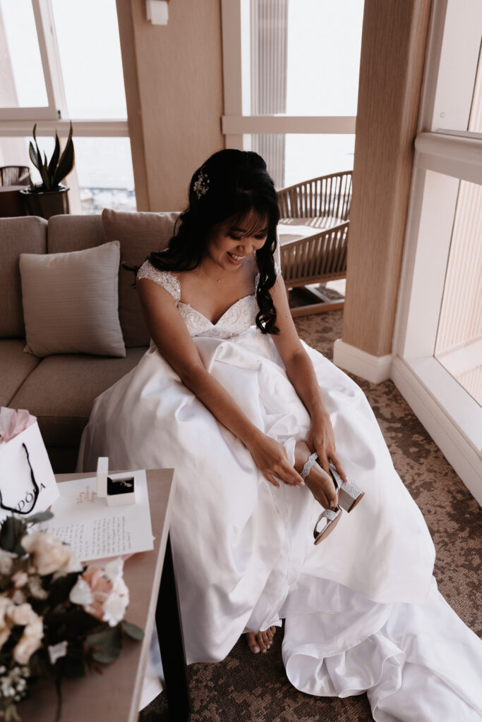 Bride getting ready in a beautifully designed hotel room on Oahu.