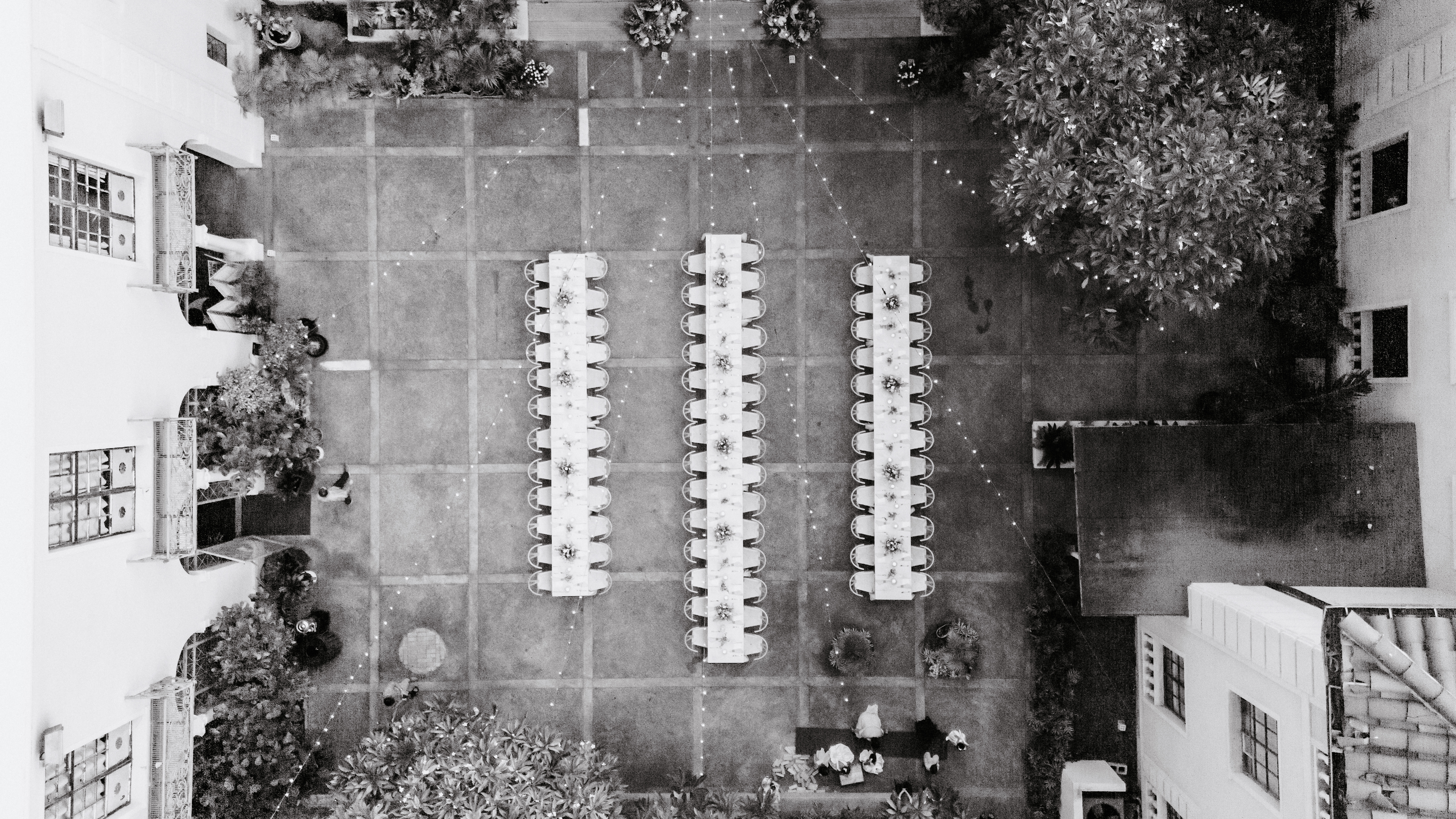 Drone view of reception tables at Cafe Julia courtyard in Hawaii
